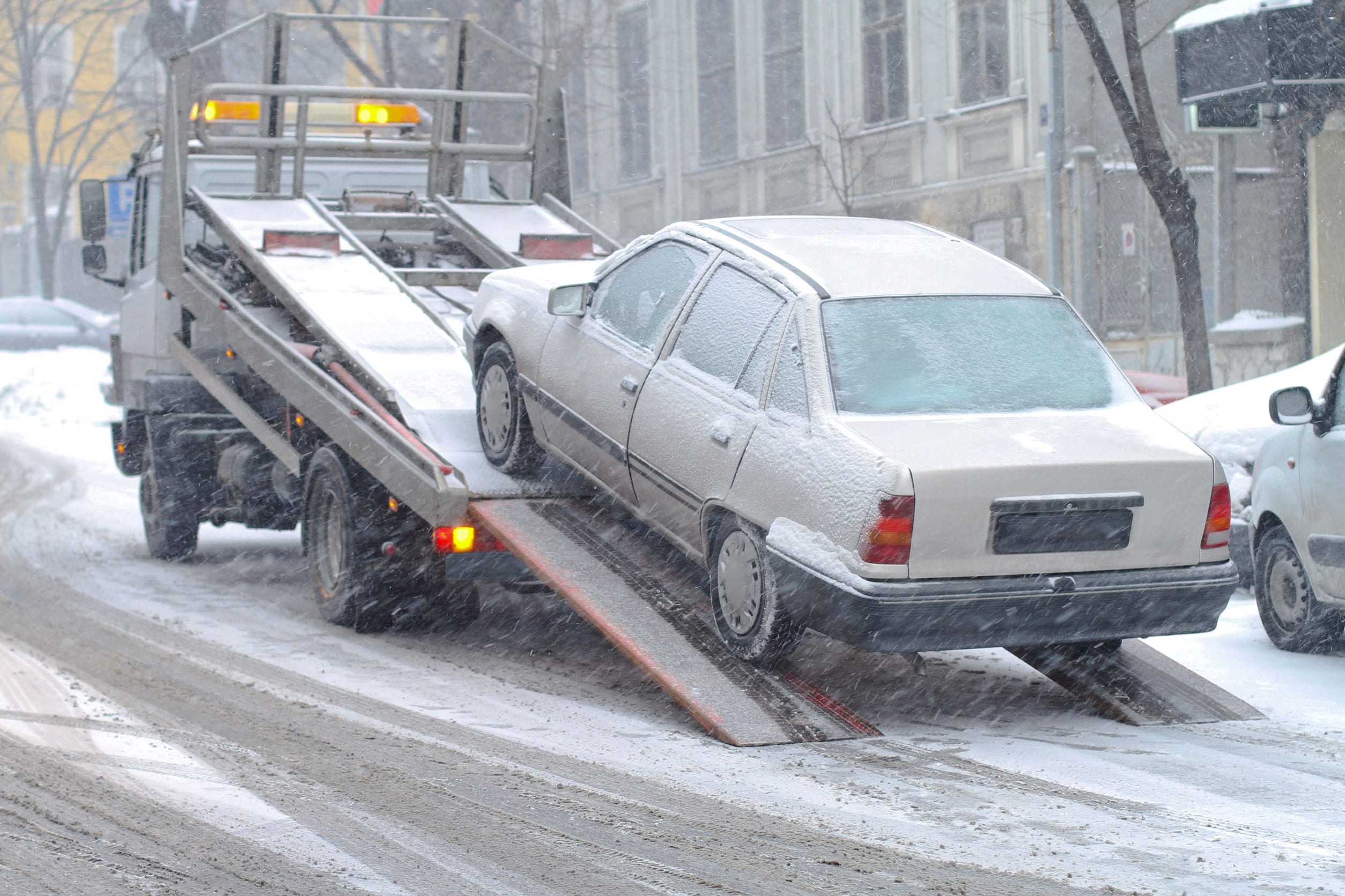 Car breakdown Car breakdown and towing assistance at snowy day